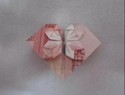 一百块钱爱心怎么折步骤图片