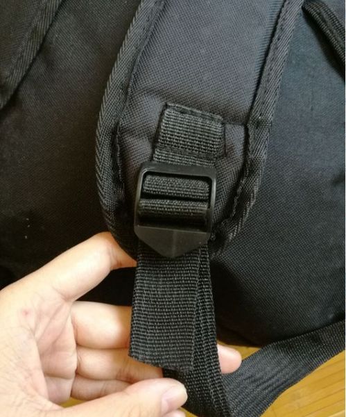 书包背带怎么系书包背带怎么系不会掉